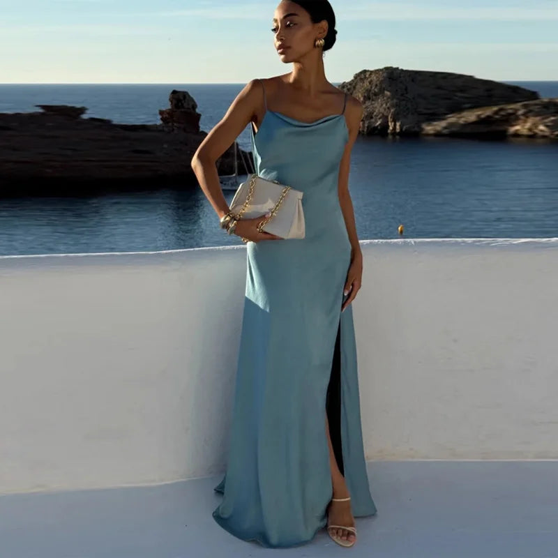 Vestido elegante para mulher com racha, cor sólida, decote quadrado, costas nuas e sem mangas, modelo comprido, ideal para festas e eventos na primavera/verão de 2026.