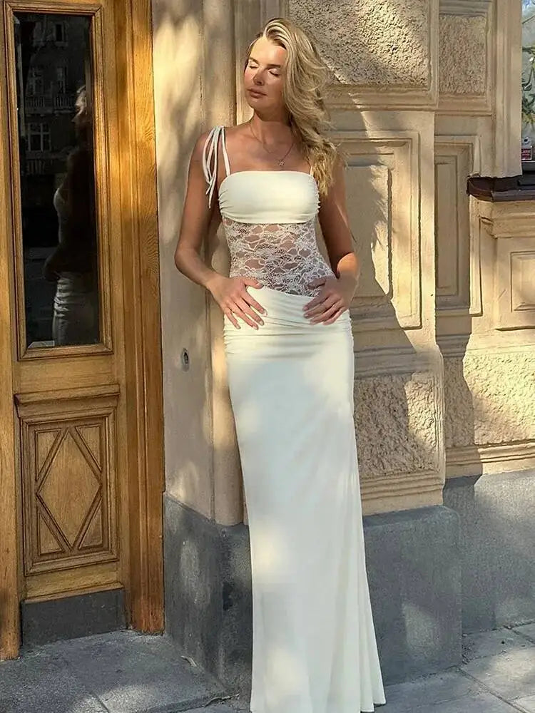Elegante Vestido de Festa Longo Sexy com Alças Finas Vazadas em Malha e Decote nas Costas - Modelo Feminino Verão 2025