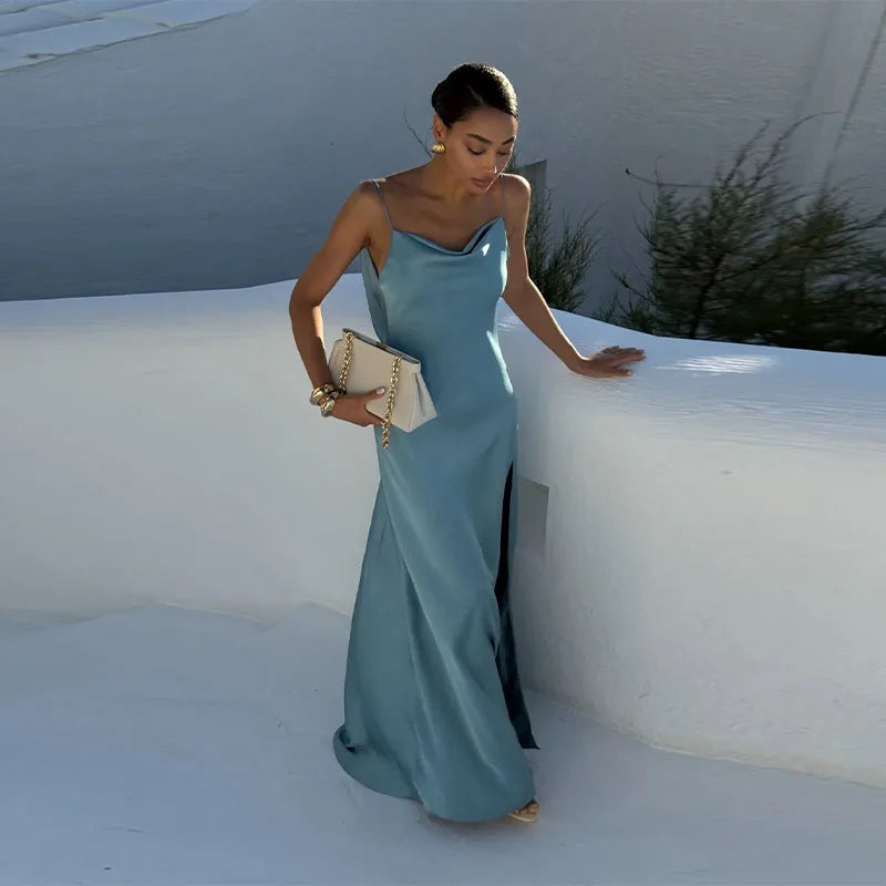 Vestido elegante para mulher com racha, cor sólida, decote quadrado, costas nuas e sem mangas, modelo comprido, ideal para festas e eventos na primavera/verão de 2026.